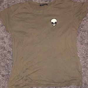 green tshirt with alien patch